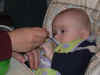 WEB 2006-12-14-Thomas in high chair 016.jpg (47365 bytes)