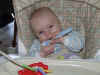 WEB 2006-12-14-Thomas in high chair 019.jpg (56697 bytes)