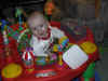 thomas in his exersaucer.jpg (61675 bytes)